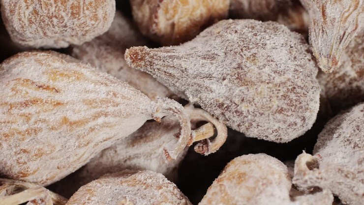 Dried organic figs fruits close-up macro. Dry healthy ingredient. Health dietary food concept. High quality 4k footage