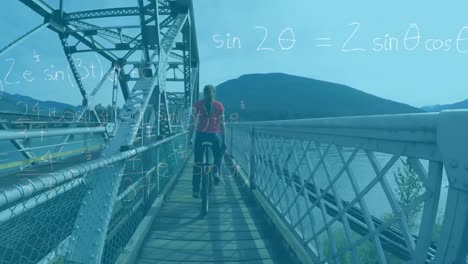 mathematical equations against woman cycling on unicycle on bridge