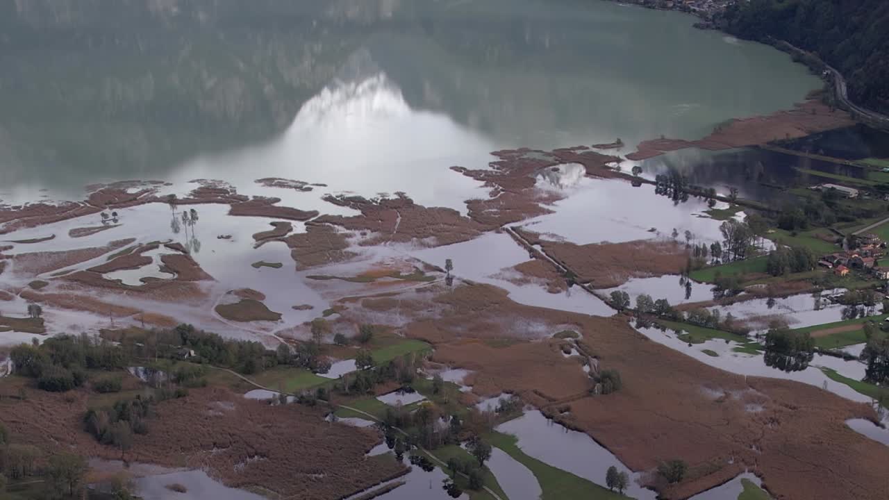 Breathtaking aerial view of the flooded wetlands in the Italian Alps