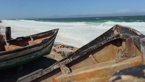 fishing boats moored on the beach