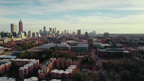 northern periphery of atlanta, georgia, usa, residential buildings punctuate the scenery as the city's skyline adorns the horizon