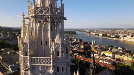 aerial orbit around bell tower of matthias church in budapest