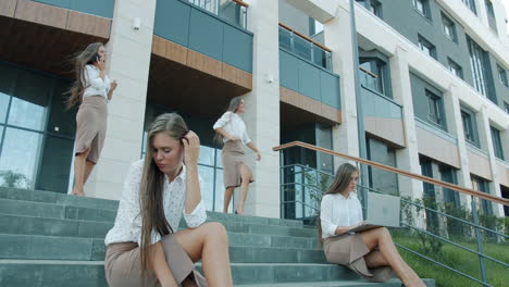 business women multitasking on stairs