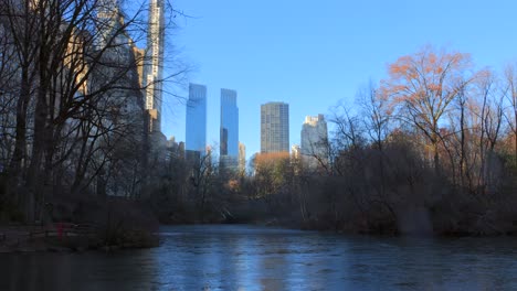 city skylines at the central park in manhattan, new york city, usa during winter