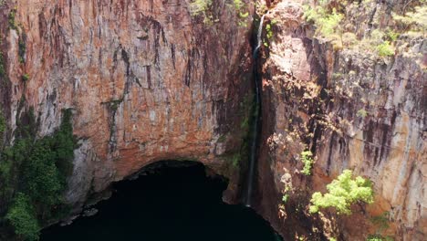 Tolmer-Falls-With-Water-Cascade-Through-Escarpment-Down-To-Plunge-Pool-In-Litchfield-National-Park,-NT,-Australia