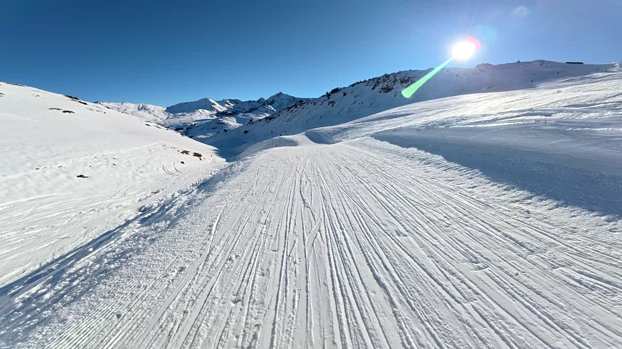 Skiing on a sunny day in the mountains