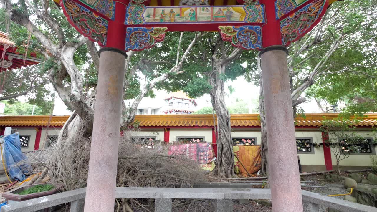Slow motion shot looking up at beautiful Chinese art of colorful dragon in the Baoan Temple Garden in Taipei, Taiwan