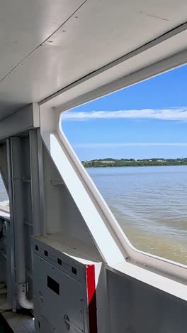 scenic river view from a moving boat