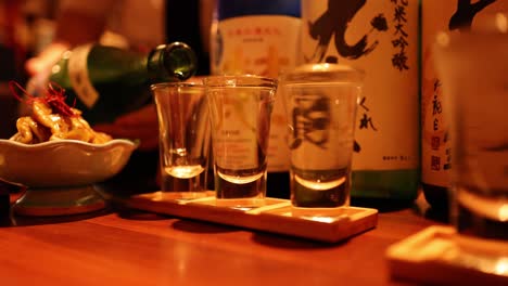 sequential sake serving in a traditional setting