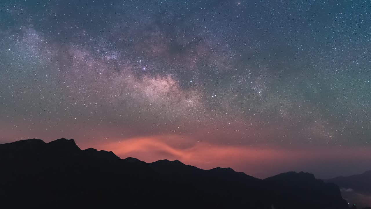 Premium stock video - Night timelapse of milky way and star rising over ...