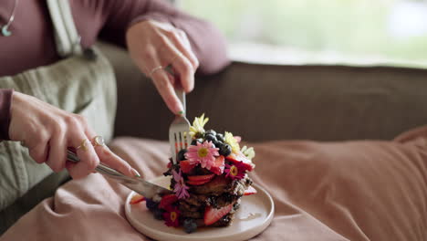 woman, hands and eating cake for breakfast