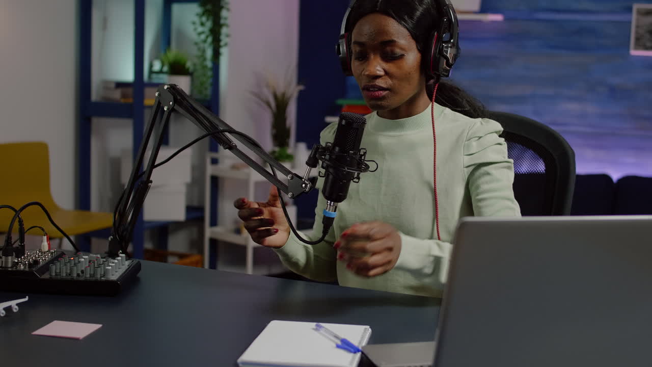 African woman recording video vlog and sharing content