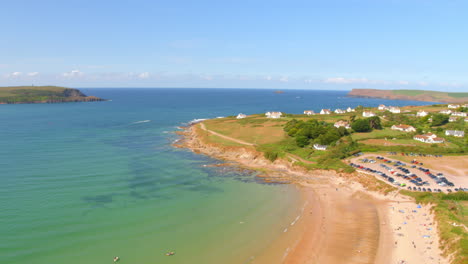 Aerial-drone-view-of-Daymer-Bay-in-Cornwall,-UK