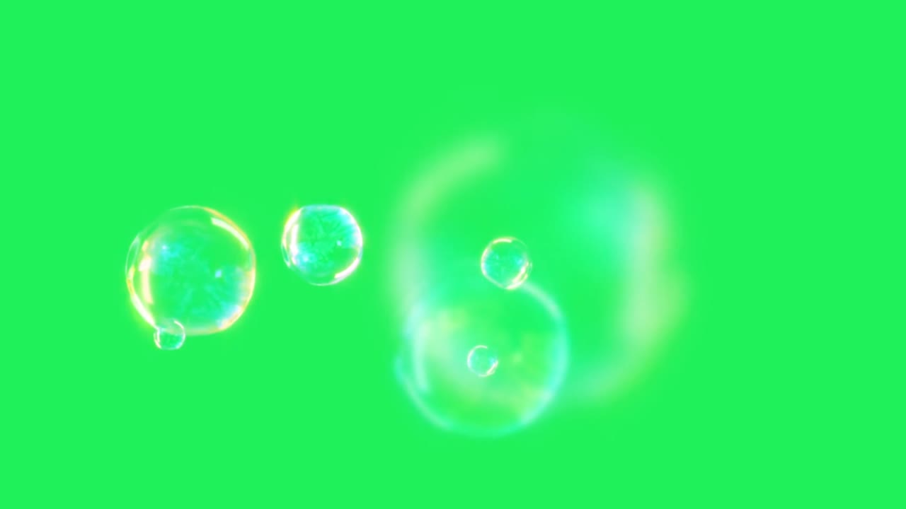 burbujas de agua de animación flotando sobre un fondo verde.