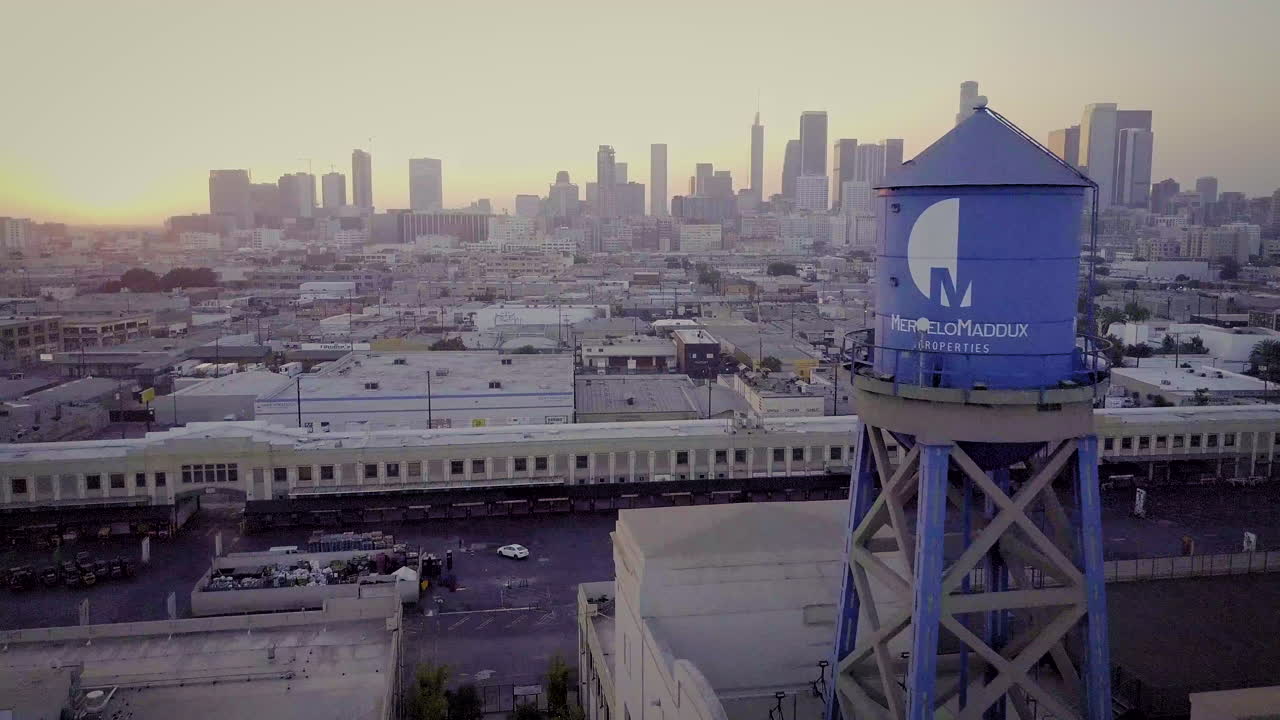 Aerial View of Downtown Los Angeles Skyline at Sunset with Water Tower