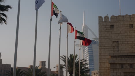 flags and burj al arab in dubai