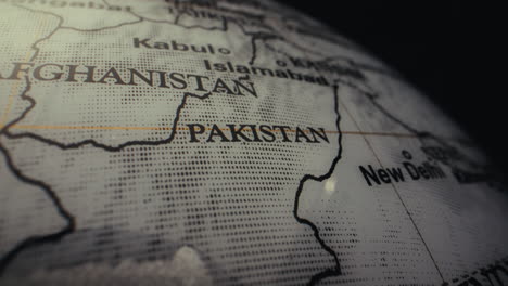 close-up of a world globe, focusing on pakistan and afghanistan