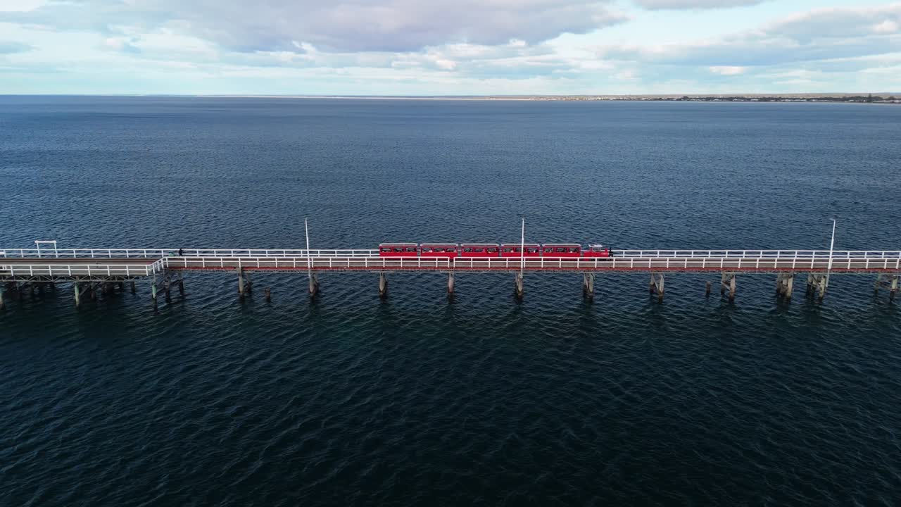 Tourist train driving along Busselton Jetty in Western Australia