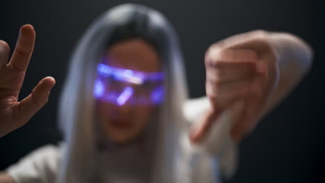 digital glasses gamer arms travelling metaverse closeup. girl playing video game