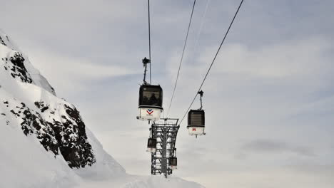 time lapse of a ski lift - gondola in the resort of meribel in the french alps