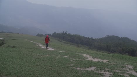 Girl-Hiking-With-Big-Rain