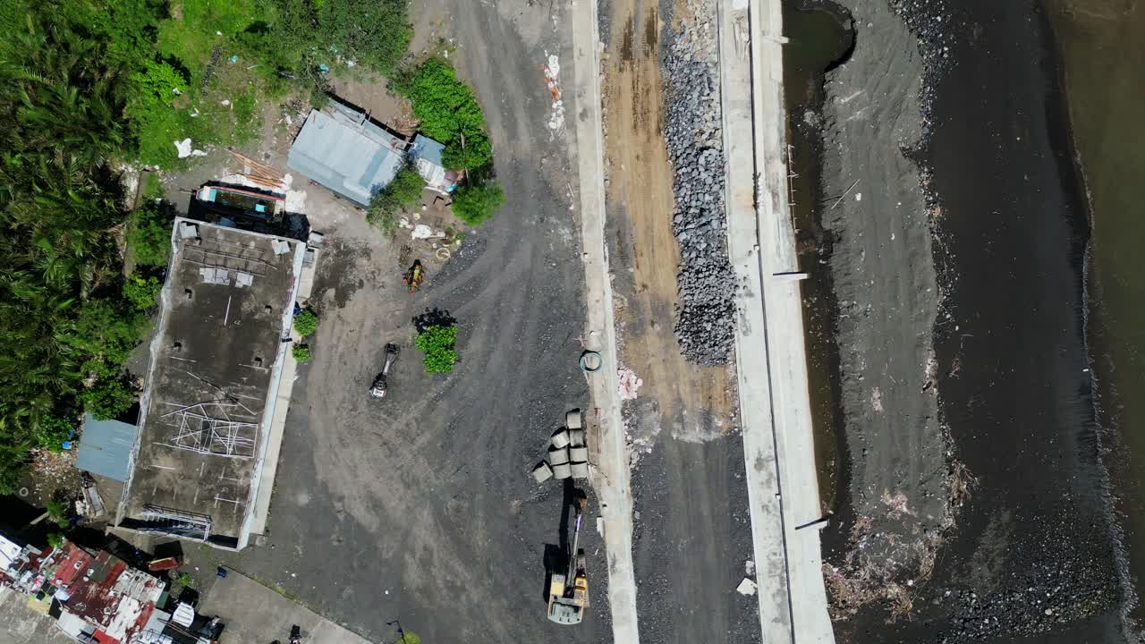 Aerial top-down view of coastal boulevard and seawall construction site at Malilipot, Albay, Bicol, Philippines