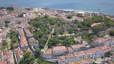 sao jorge is a moorish castle occupying a commanding hilltop overlooking the historic centre of the city of lisbon