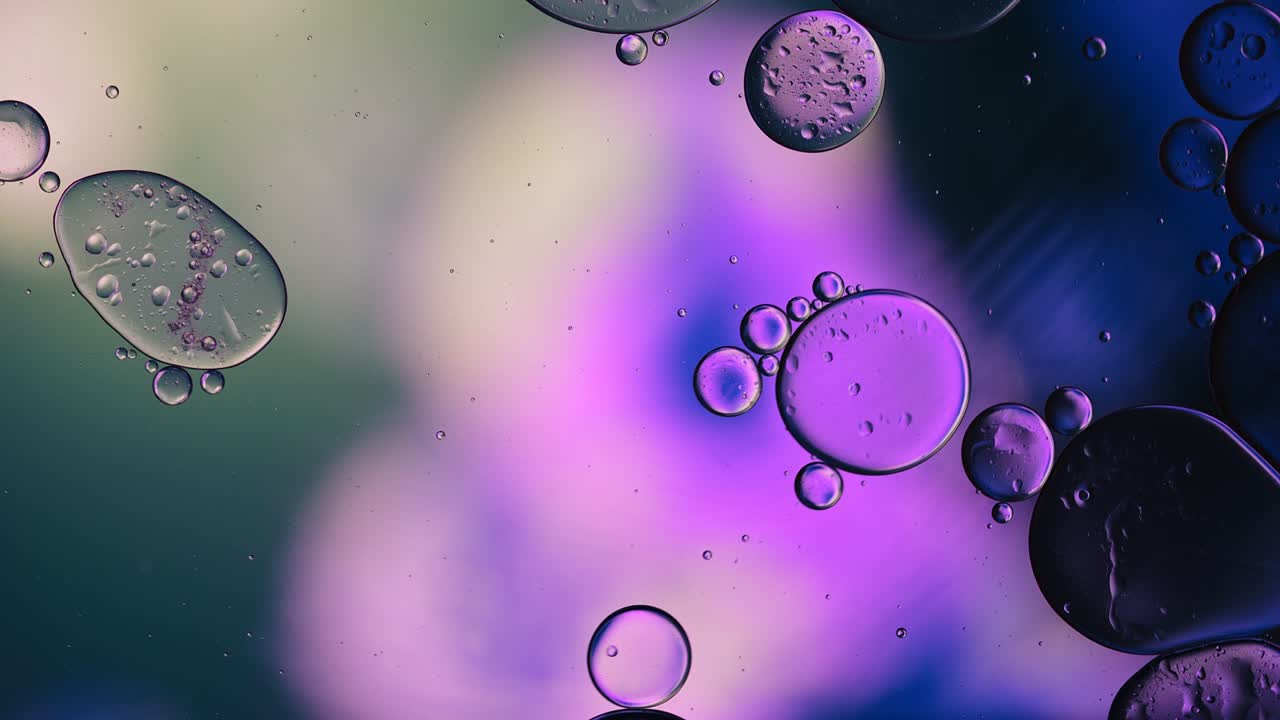 Abstract Colorful Food Oil Drops Bubbles and spheres Flowing