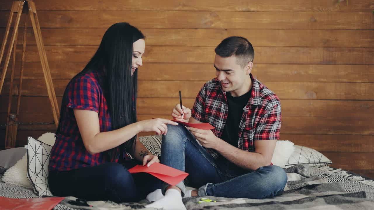 Smiling young couple in studio. Portrait of happy young couple love together in studio