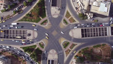 Vista-Aérea-Straight-Down-Of-Traffic-Circle-Or-Roundabout-With-Car-Traffic-Amman-Jordan-2