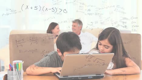 Mathematical-equations-against-kids-using-laptop-