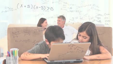 mathematical equations against kids using laptop