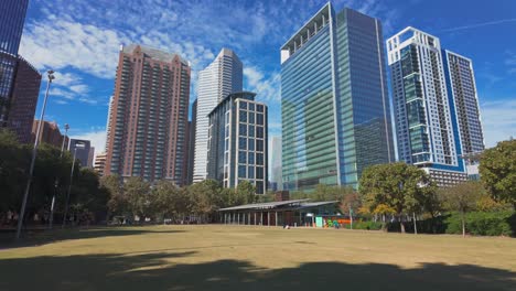 open grass area in discovery green park in houston on a sunny day