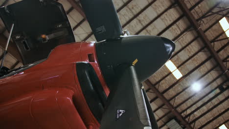 propellor plane in a hangar