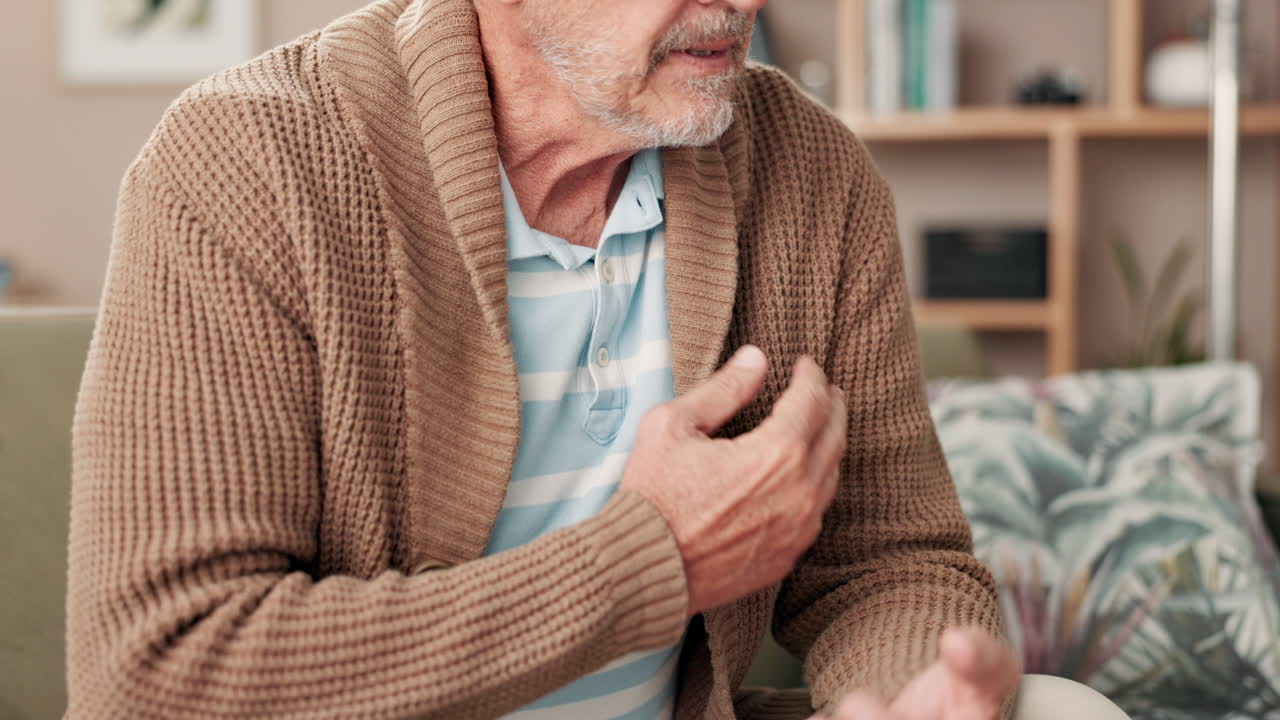 Senior man experiencing chest pain