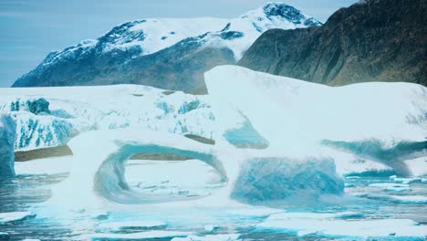 Antarctic-icebergs-near-rocky-beach