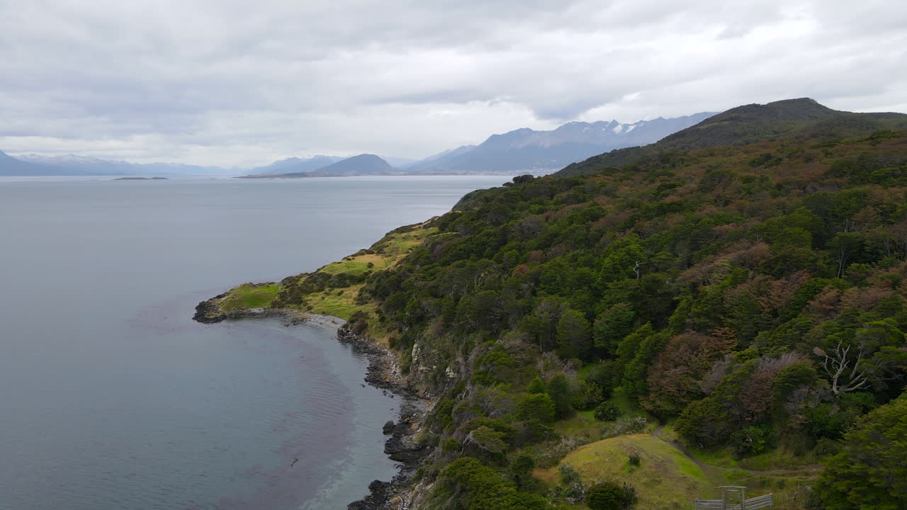 Drone flying forward over the coast of Ushuaia Patagonia Argentina, next to Beagle Channel