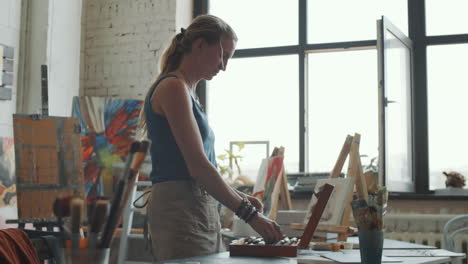 artist in a painting studio