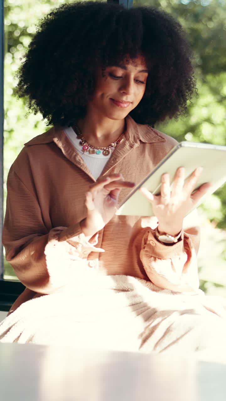 Woman using tablet outdoors
