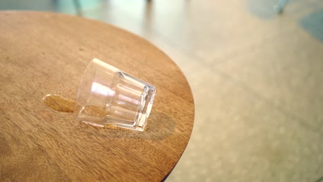 empty glass on a wooden table