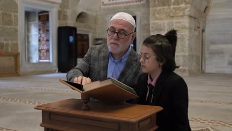 Grandfather-and-grandson-learning-quran