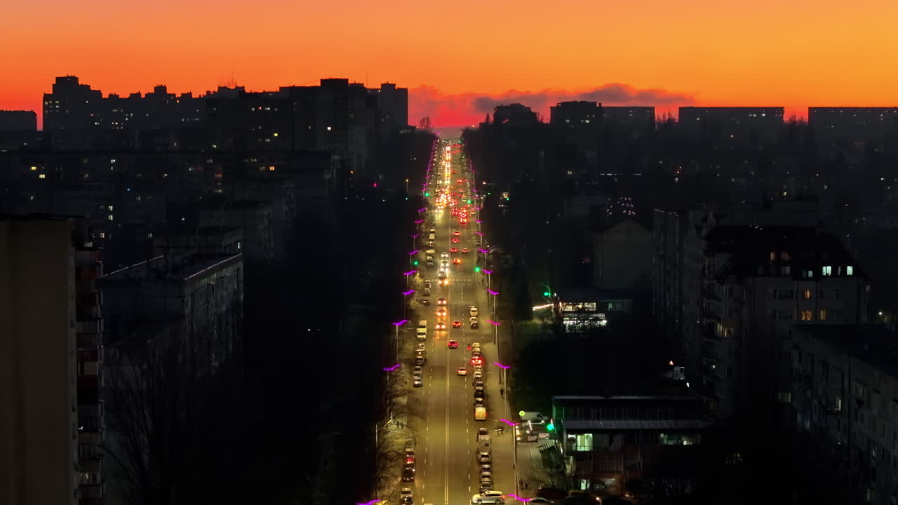 Aerial drone view of cars in traffic in Chisinau, Moldova at sunset