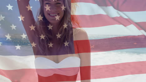 animación de la bandera de los ee.uu. sobre mujer caucásica en la playa en verano