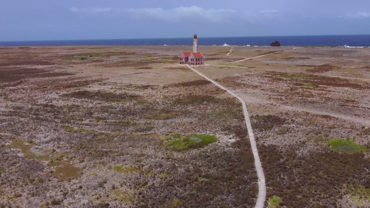 Aerial Tilt Reveal of Abandoned Historic Colonial Light Tower by Ocean