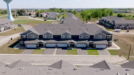 aerial view of newly built townhomes in north american rural suburb community