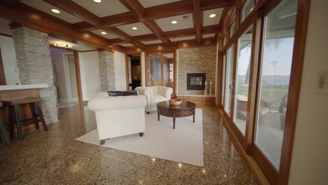 modern and elegant seating area with a fireplace in a luxury mansion