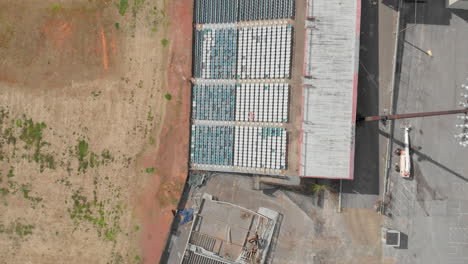 Abandoned-baseball-field-top-down-stadium-empty-seats-aerial-at-day