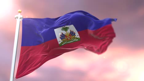 bandera de haiti ondeando en el viento al atardecer, bucle