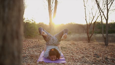 young womans doing yoga,yoga and meditation in early life cut health