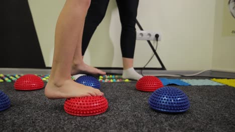 Sportswearclad individuals balance on colored ball 4k 2025 08 05 00 13 08 utc.mov | acrobat, active, activity, agility